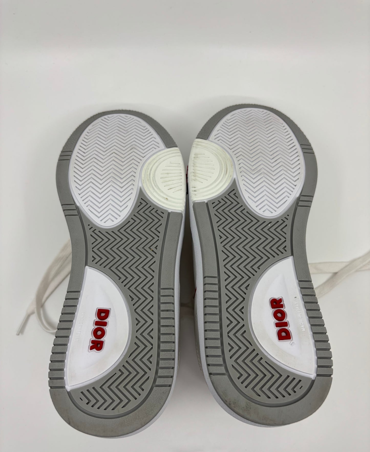 Sneaker Dior de caña baja B27 de piel de becerro lisa blanca y roja Oblique Galaxy