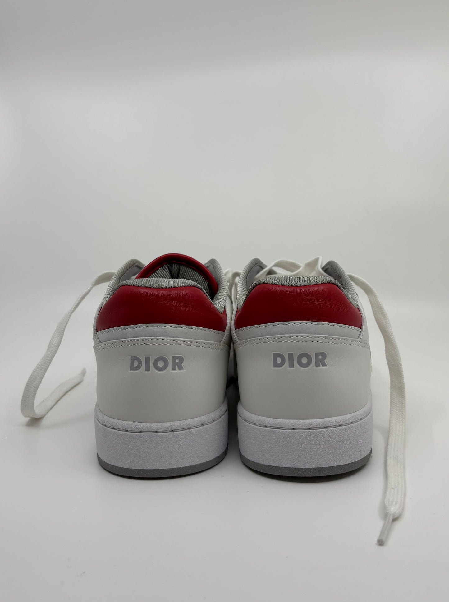 Sneaker Dior de caña baja B27 de piel de becerro lisa blanca y roja Oblique Galaxy